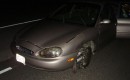 1998 Mercury Sable with blown tires from car chase