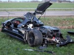 20-year-old crashes Gumpert Apollo supercar. Photo via Reuters.