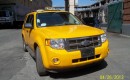 2009 Ford Escape Hybrid New York taxi (Image: eBay Motors)