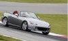 2009 Honda S2000 driving on a racetrack