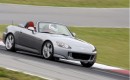 2009 Honda S2000 driving on a racetrack