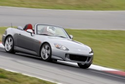 2009 Honda S2000 driving on a racetrack