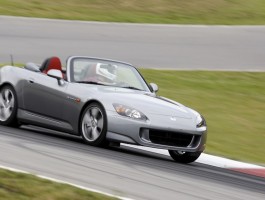 2009 Honda S2000 driving on a racetrack
