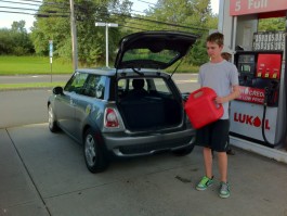 Filling up the Mini E at the gas station; photo, Michael Thwaite