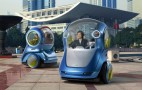 GM's Future City-Car Vision: Autonomous, Electric, Two-Wheeler