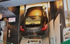 Porsche Panamera squeezed into elevator for  94th story presentation