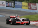 Tony Stewart and Lewis Hamilton swap cars at Watkins Glen, 2011