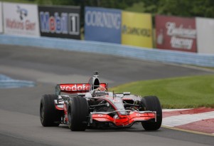 Tony Stewart and Lewis Hamilton swap cars at Watkins Glen, 2011