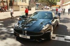 Prince Albert of Monaco and Henrik Fisker drive Fisker Karma on Monaco Grand Prix circuit, May 2011