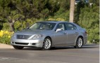 Mechanic Saves Hawk Wedged Into Lexus LS 460 Grille