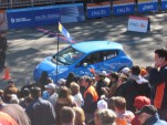 2011 Nissan Leaf electric car at NYC Marathon, Oct 2010, with Marathon CEO Mary Wittenberg