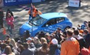 2011 Nissan Leaf electric car at NYC Marathon, Oct 2010, with Marathon CEO Mary Wittenberg