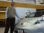 John Duncan takes delivery of one of the first 2011 Nissan LEAF EVs, near Portland OR, 12/15/2010