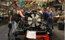 Auto workers adjusting the chassis of the 2011 Chevrolet Silverado HD