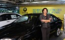 First delivery of 2012 Coda Sedan, at Coda Los Angeles, to buyer "Carmen," March 2012