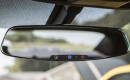 2013 Chevrolet Camaro's frameless rear-view mirror with electrochromic OnStar buttons