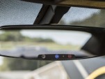 2013 Chevrolet Camaro's frameless rear-view mirror with electrochromic OnStar buttons