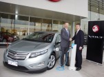 2013 Holden Volt with Better Place Charge Spot and executives from both companies