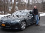 2013 Tesla Model S electric sport sedan on delivery day, with owner David Noland