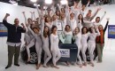 26 people squeeze into MINI Cooper