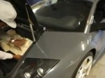 50 Cent loading a Lamborghini full of cash