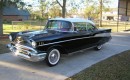 A 1957 Chevy Bel Air Hardtop, in the same color scheme as Dr. Phil's missing convertible 