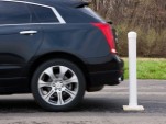 A Cadillac SRX demonstrates Rear Automatic Braking - image: John F. Martin for Cadillac