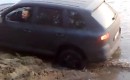 A Porsche Cayenne’s tire explodes when stuck in the mud
