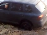 A Porsche Cayenne’s tire explodes when stuck in the mud