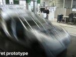 A secret prototype disguised on film at BMW's Plant Zero