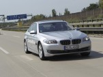 A semi-autonomous BMW 5 Series, on the highway outside of Munich 