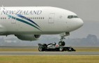A1GP car drag races Boeing 777