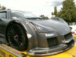 Adrian Sutil wrecks Gumpert Apollo at the 'Ring. Photo via Bridge To Gantry.