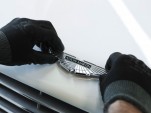 Affixing the Aston Martin badge