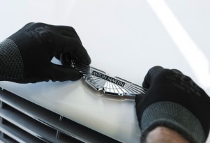 Affixing the Aston Martin badge