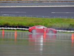An Aston Martin in the wet at the Boxberg Proving Grounds