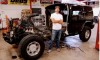 Artist Jeremy Dean with half a Hummer H2 for his work, "Back to the Futurama," January 2010