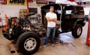 Artist Jeremy Dean with half a Hummer H2 for his work, "Back to the Futurama," January 2010
