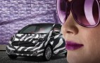 Aston Martin Goes Green With Zebra-Skin Baby Swan From Toyota