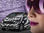 Aston Martin Goes Green With Zebra-Skin Baby Swan From Toyota