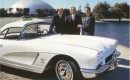 Astronaut Alan Shepard (center) with GM reps and his 1962 Corvette