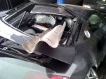 Audi R8 skewered on guard rail