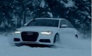 Audi's A6 quattro plays in the snow.