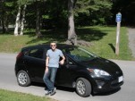 Car Negotiation Tips: More Than The Selling Price New-car owner John Knox with his 2011 Ford Fiesta SE hatchback, May 2011