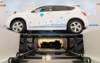 Better Place shows off its automated EV battery switching station