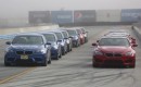 BMW M5s and M6s, lined up for track day action at Laguna Seca