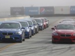 BMW M5s and M6s, lined up for track day action at Laguna Seca