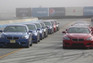 BMW M5s and M6s, lined up for track day action at Laguna Seca