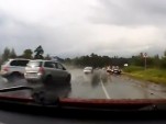 BMW X5 spins out of control and crashes in the wet