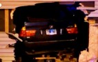 Police Chase Ends With BMW X5 Landing On Top Of Sleeping Man